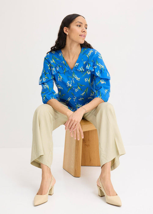 Bluza s uzorkom i volanima