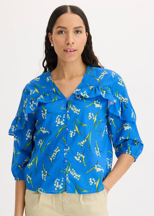 Bluza s uzorkom i volanima