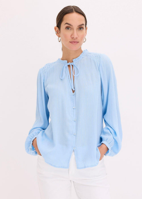Bluza s metaliziranim prugama