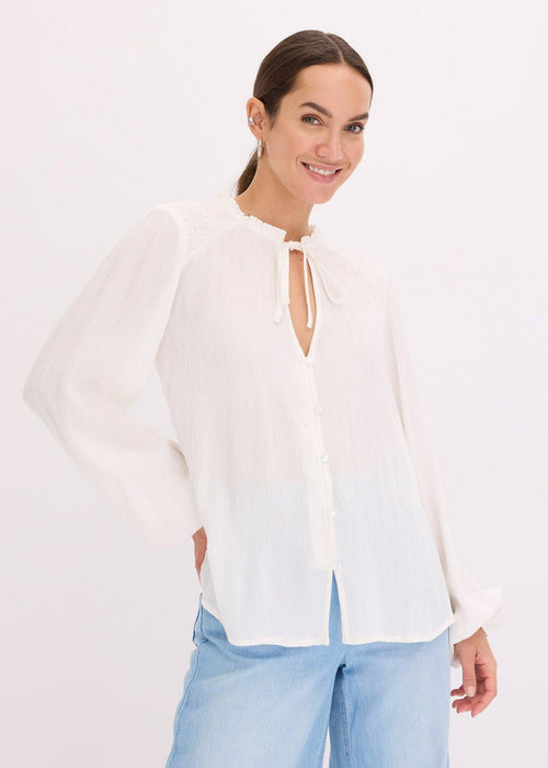 Bluza s metaliziranim prugama