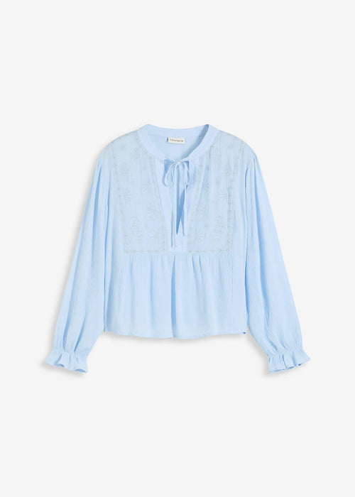 Bluza s rupičastim vezom
