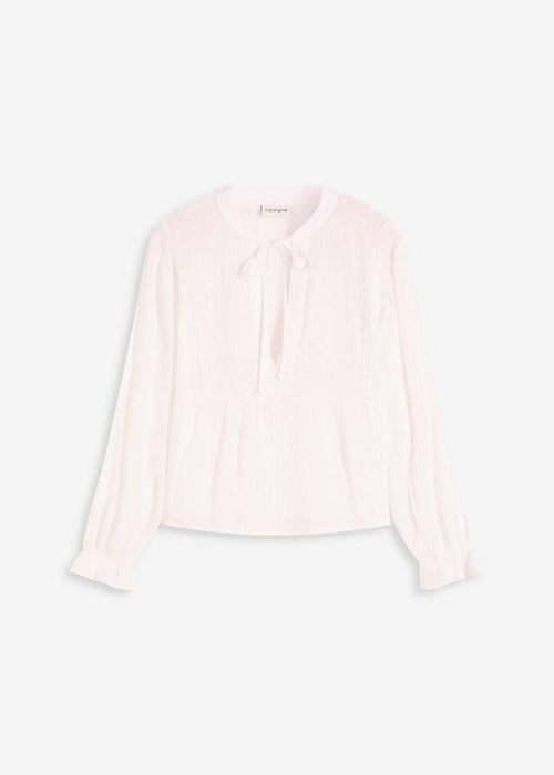 Bluza s rupičastim vezom